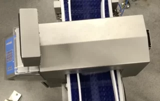 conveyor retracting reject opt
